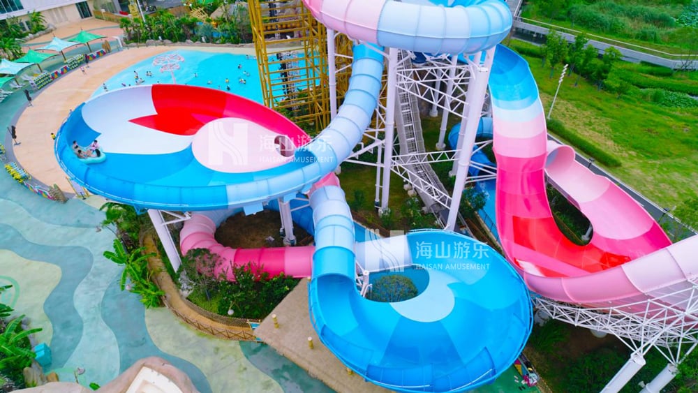 双重风暴，极致竞速——星际盘旋+巨浪翻滚组合引爆水乐园刺激体验